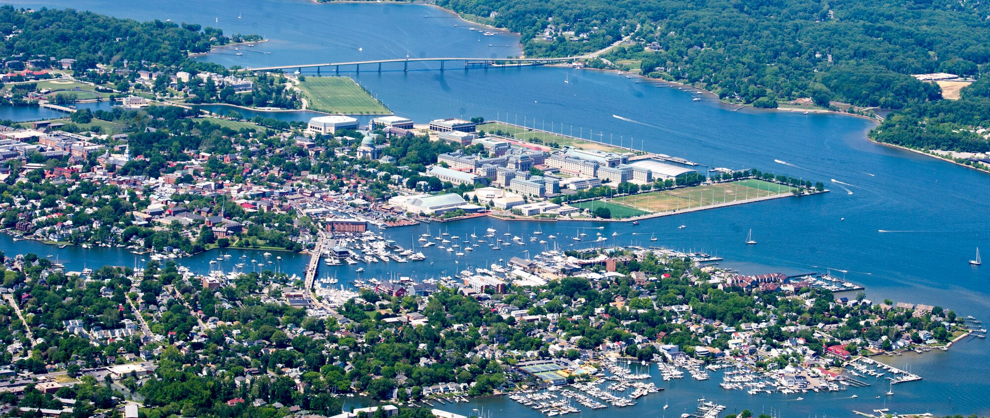 Rick Micker, Congressional Squadron member, Civil Air Patrol, flies a CAP Cessna past the U.S. Naval Academy in Annapolis, Md., May 23, 2015. The fly-by was part of a CAP orientation flight from Joint Base Andrews, Md., to Cambridge-Dorchester Airport, Md. (U.S. Air Force photo/Airman 1st Class Ryan J. Sonnier)