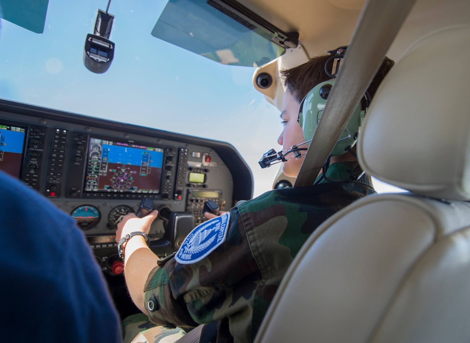 Cadet Benjamin Licciardi, Andrews Composite Squadron, Civil Air Patrol, takes control of the yoke during an orientation flight from Joint Base Andrews, Md., to Cambridge-Dorchester Airport, Md., May 23, 2015. This was Licciardi’s second time flying an aircraft. (U.S. Air Force photo/Airman 1st Class Ryan J. Sonnier)