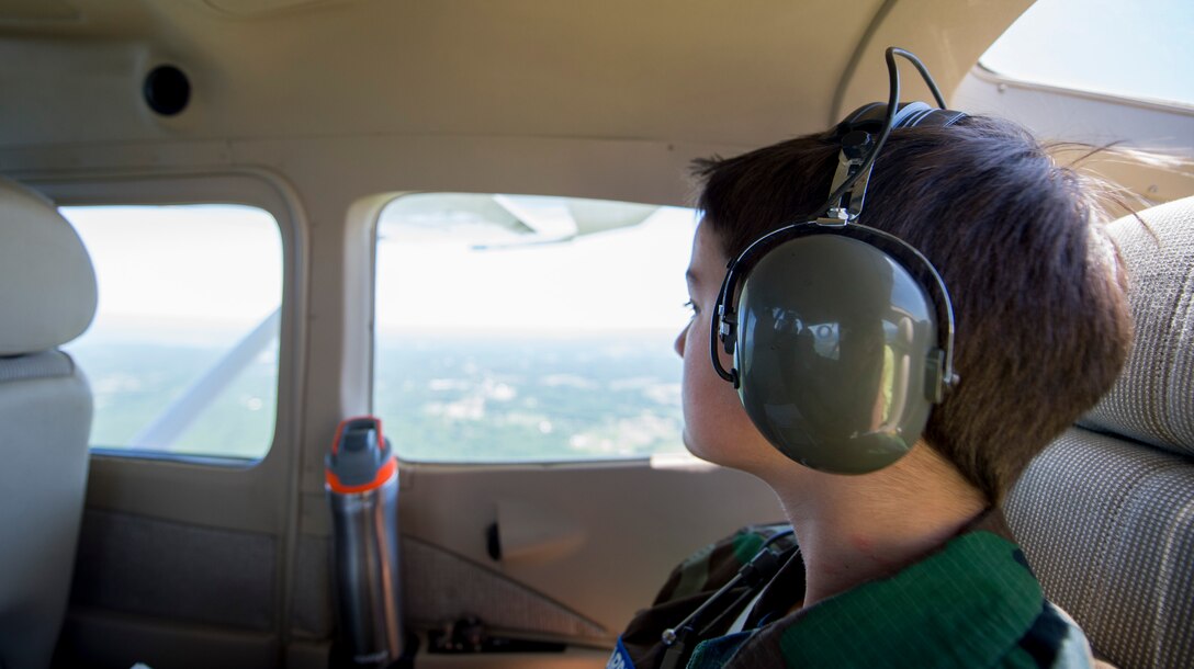 Cadet Benjamin Licciardi, Andrews Composite Squadron, Civil Air Patrol, looks out the window of a CAP Cessna during a flight from Joint Base Andrews, Md., to Cambridge-Dorchester Airport, Md., May 23, 2015. This is Licciardi’s second orientation flight. (U.S. Air Force photo/Airman 1st Class Ryan J. Sonnier)