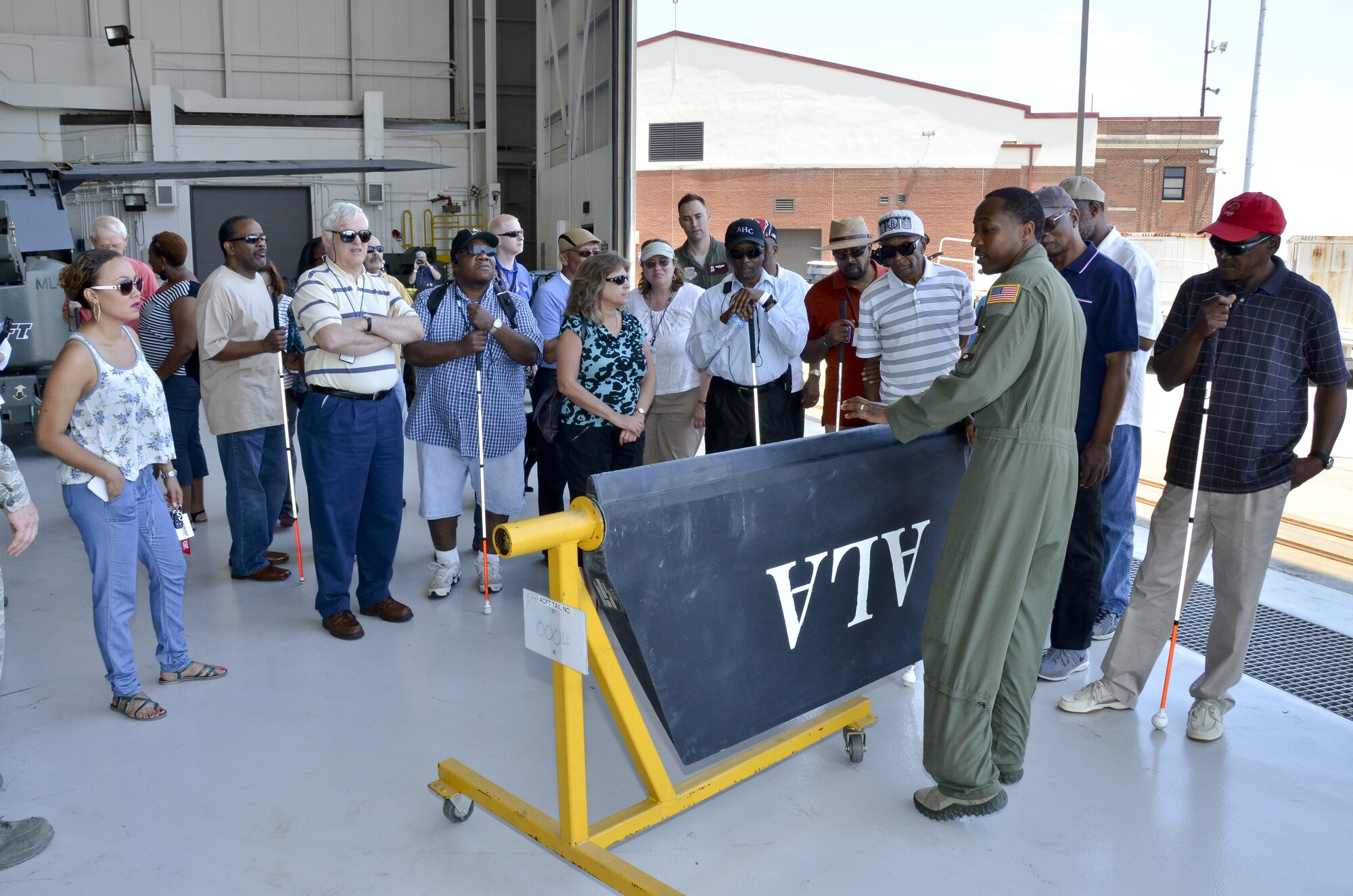 Visually impaired veterans from the Southeastern Blind Rehabilitation Center visit the 117th Air Refueling Wing. The SBRC is a division of the United States Veterans Administration whose mission is to provide care for blind and low vision veterans and active duty service members. (U.S. Air National Guard photo by: Senior Master Sgt. Ken Johnson/Released)