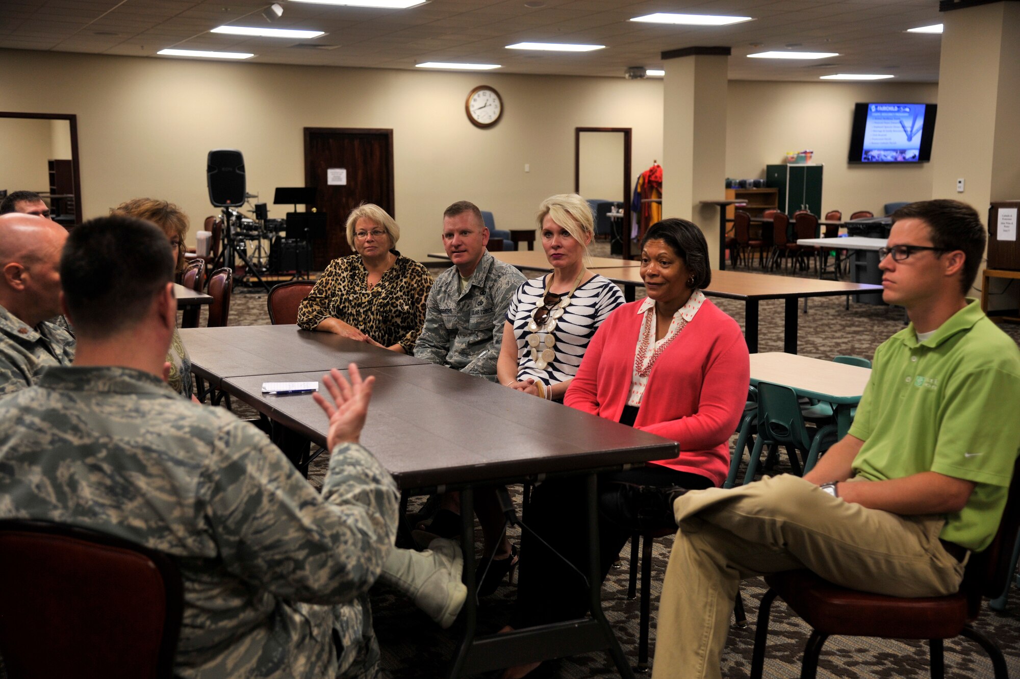 Evelyn McDew, wife of Air Mobility Command commander, Gen. Darren McDew, speaks with the chapel staff May 21, 2015, in the Red Morgan Center at Fairchild Air Force Base, Wash. Mrs. McDew met with the chaplains and other staff members to learn about the different services the chapel offers. She was informed of the renovations the chapel building is currently under, but was made aware the chapel is still providing services at the Red Morgan Center. (U.S. Air Force photo/Airman 1st Class Taylor Bourgeous)