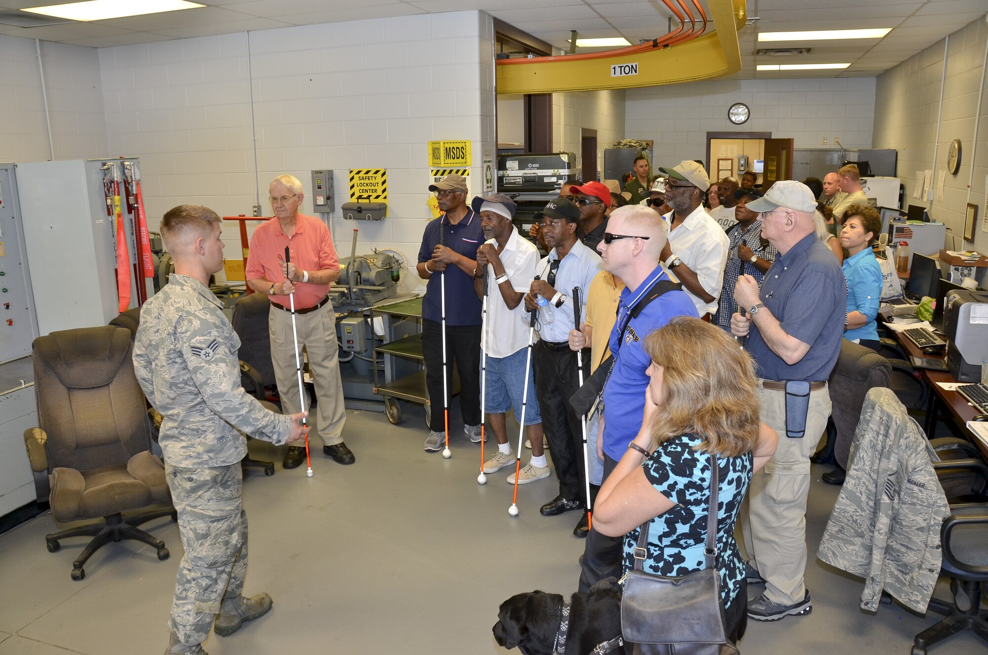 Visually impaired veterans from the Southeastern Blind Rehabilitation Center visit the 117th Air Refueling Wing. The SBRC is a division of the United States Veterans Administration whose mission is to provide care for blind and low vision veterans and active duty service members. (U.S. Air National Guard photo by: Senior Master Sgt. Ken Johnson/Released)