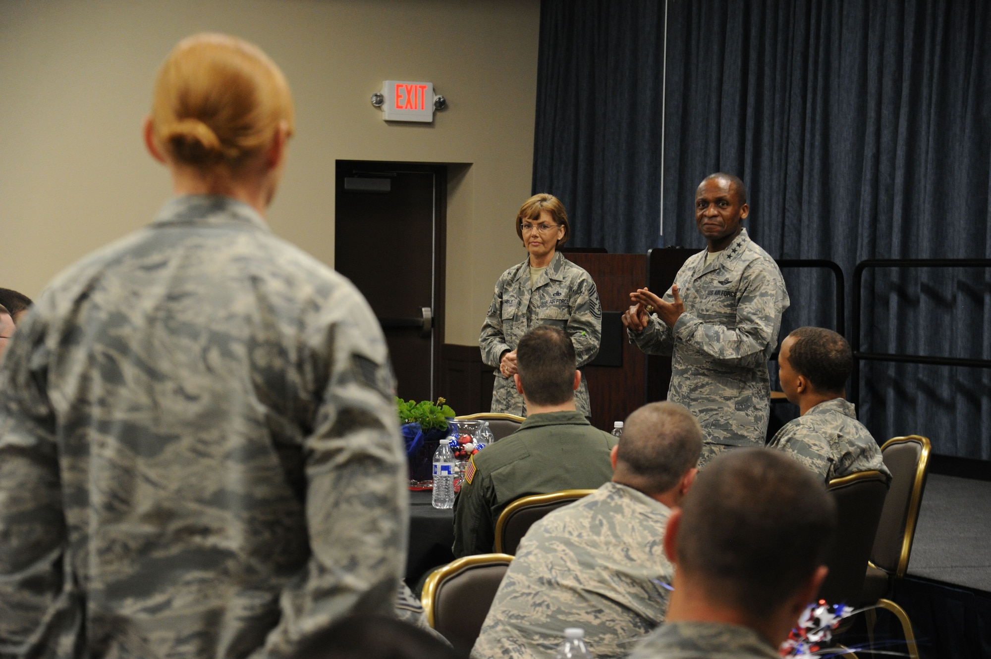 Gen. Darren McDew, Air Mobility Command commander, and Chief Master Sgt. Victoria Gamble, AMC command chief, share anecdotal insights from their respective careers during a breakfast with staff sergeants May 21, 2015, at Fairchild Air Force Base, Wash. McDew and Gamble spoke with the staff sergeants, answered their questions and emphasized their importance as the backbone of the Air Force. (U.S. Air Force photo/Airman 1st Class Nicolo J. Daniello)