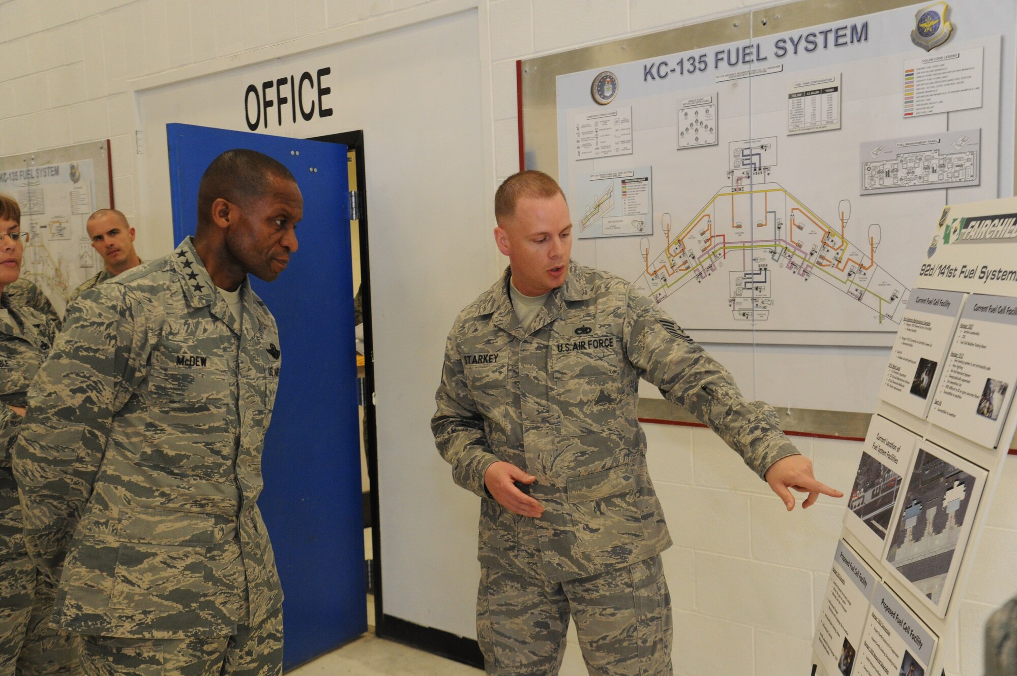 Tech. Sgt. Shane Starkey, 92nd Maintenance Squadron aircraft fuel systems NCO in charge, briefs about the fuel cell facility to Gen. Darren McDew, Air Mobility Command commander, May 20, 2015, at Fairchild Air Force Base, Wash. Starkey spoke about the fuel cell facility and its importance to the air refueling mission at Fairchild. (U.S. Air Force photo/Airman 1st Class Nicolo J. Daniello)
