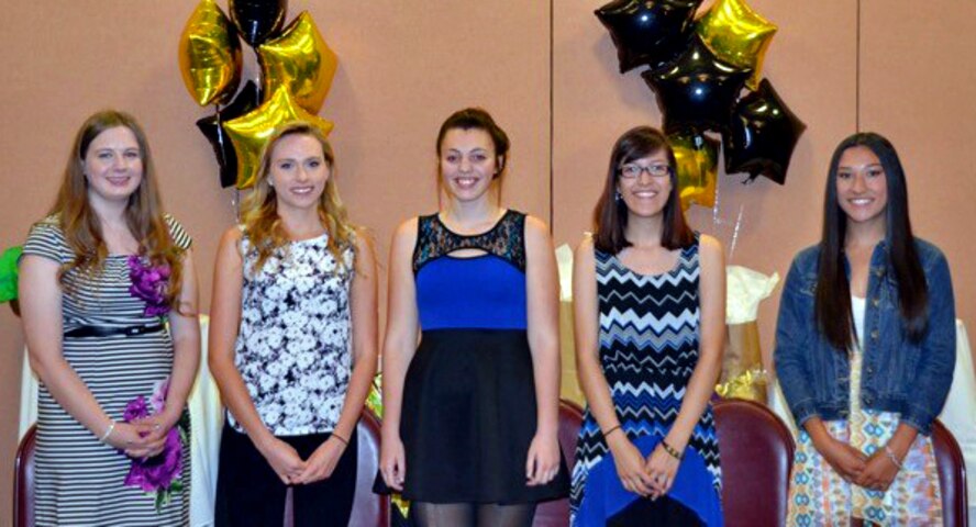 Sara Todd, Anastasia Nikolaeva, Gabrielle Hayes, Jessica Calahorrano, and Marissa Rodriguez (left to right), high school students and children of military service members, receive scholarships from the Beale Officers' Spouses' Club May 19, 2015, at Beale Air Force Base, Calif. The total amount of the scholarships awarded was $12,000. (Courtesy photo) 