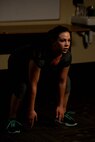 Senior Airman Morissa Martin, 28th Medical Operations Squadron aerospace medical technician, performs squats during her work out at Ellsworth Air Force Base, S.D., May 19, 2015. To improve her overall fitness, Martin follows a healthy diet plan to maximize benefits from her weekly workouts. (U.S. Air Force photo by Airman 1st Class Rebecca Imwalle/Released)