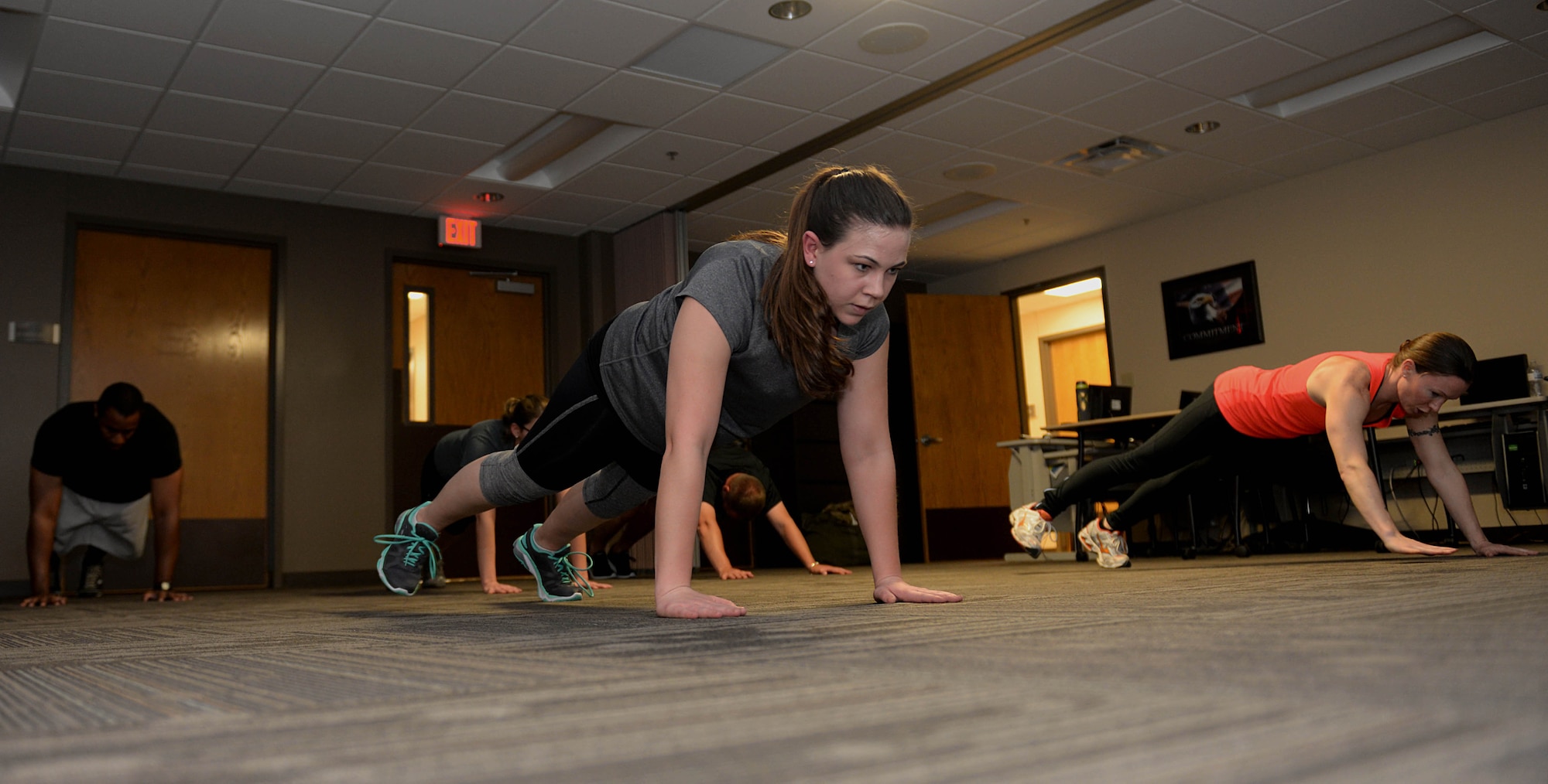 Senior Airman Morissa Martin, 28th Medical Operations Squadron aerospace medical technician, performs core-strengthening exercises during a personal workout routine at Ellsworth Air Force Base, S.D., May 19, 2015. Martin also participates in yoga and cycling each week to improve her physical fitness. (U.S. Air Force photo by Airman 1st Class Rebecca Imwalle/Released)