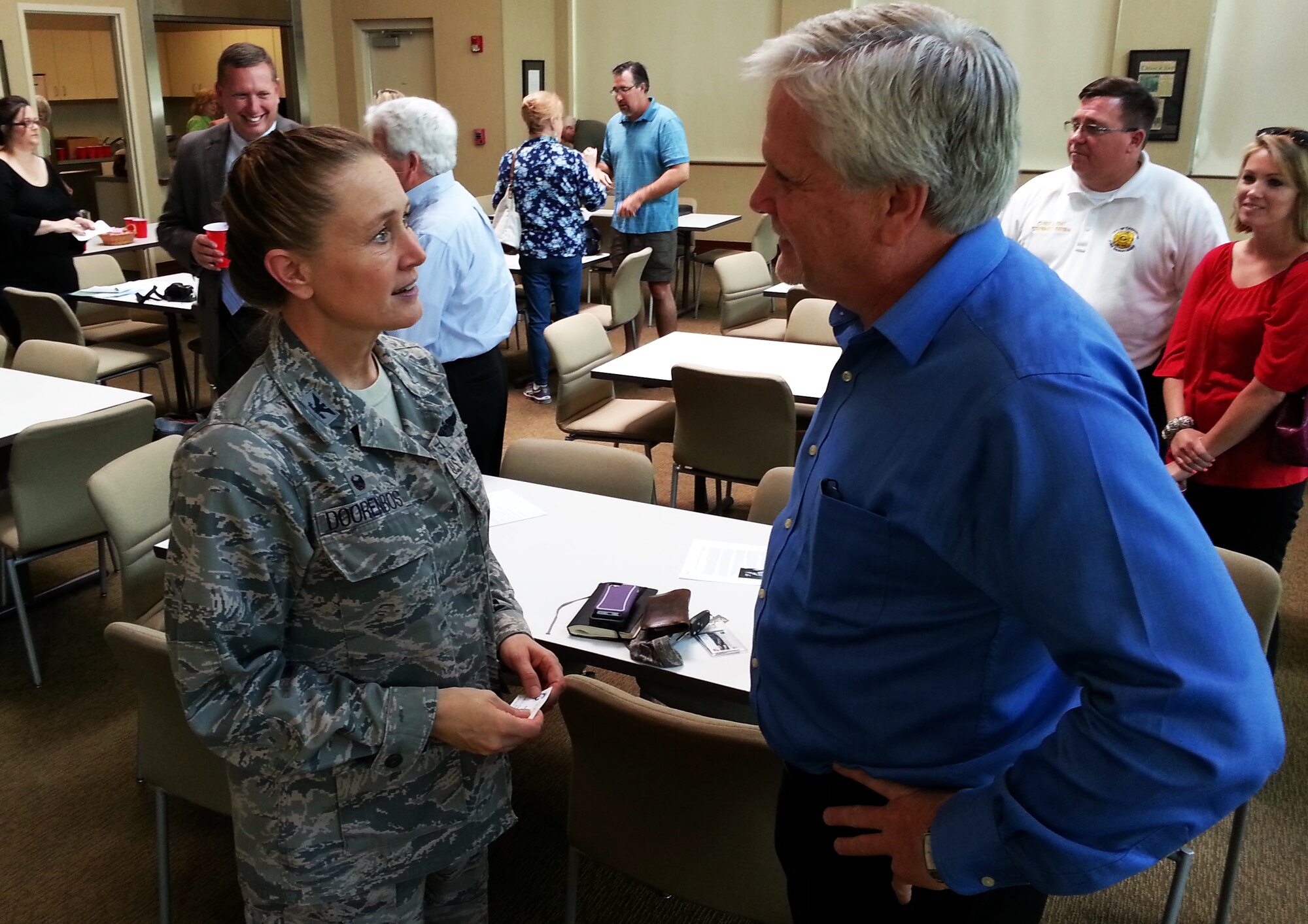 Col. Bobbi Doorenbos, 188th Wing commander, left, speaks with Greenwood (Ark.) mayor Doug Kinslow May 20 at Farmer’s Bank in Greenwood. Doorenbos gave a 188th mission conversion update briefing to Focus on Greenwood, a local group of business and civic leaders. (U.S. Air National Guard photo by Maj. Heath Allen/released)