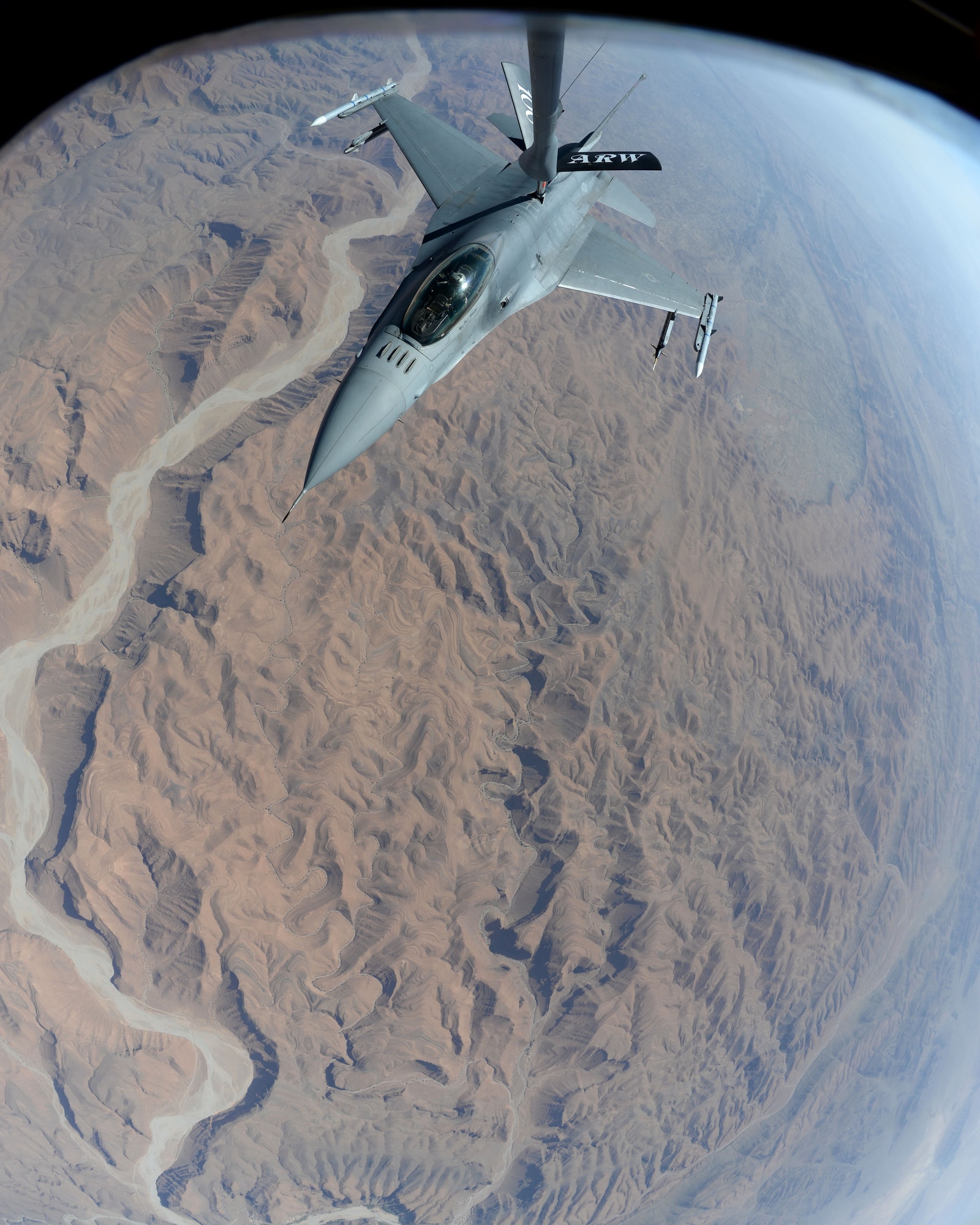 An F-16 Fighting Falcon from Spangdahlem Air Base, Germany, receives fuel from a KC-135 Stratotanker assigned to RAF Mildenhall, England, while flying in Exercise African Lion May 21, 2015. The exercise features first-time integrated flying operations training and is the largest Department of Defense exercise on the continent. (U.S. Air Force photo by Senior Airman Kate Thornton/Released)