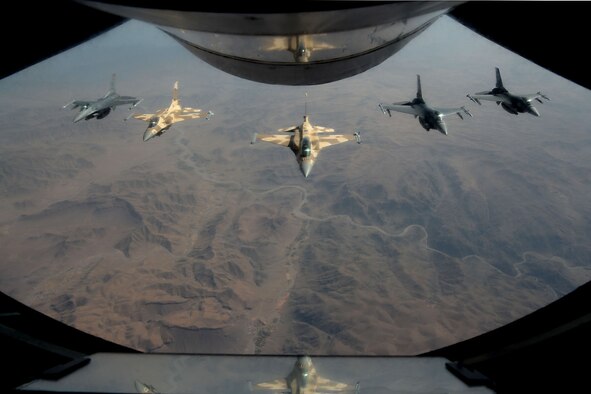 Royal Moroccan air force and U.S. Air Force F-16 Fighting Falcons fly in a formation during Exercise African Lion after air-refueling May 21, 2015. The exercise is an annual, bilateral U.S. and Moroccan sponsored exercise designed to improve interoperability and mutual understanding of each nation's tactics, techniques and procedures. (U.S. Air Force photo by Senior Airman Kate Thornton/Released)
