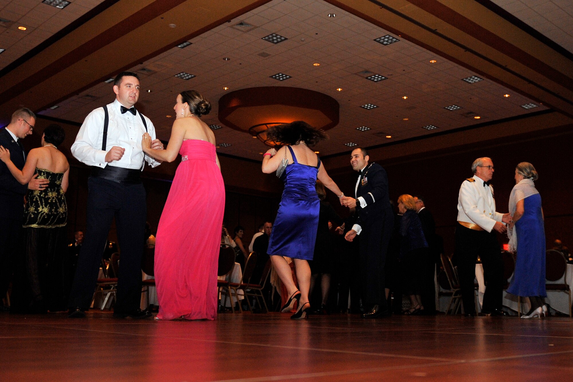 Patrons enjoy a night of dancing at the Embassy Suites ballroom in La Vista, Nebraska, for the 2015 55th Wing Birthday Ball, May 16. The birthday ball is a formal celebration recognizing the wing’s proud heritage as well as its current mission and role in the U.S. Air Force. (U.S. Air Force photo by Jeff W. Gates/Released)