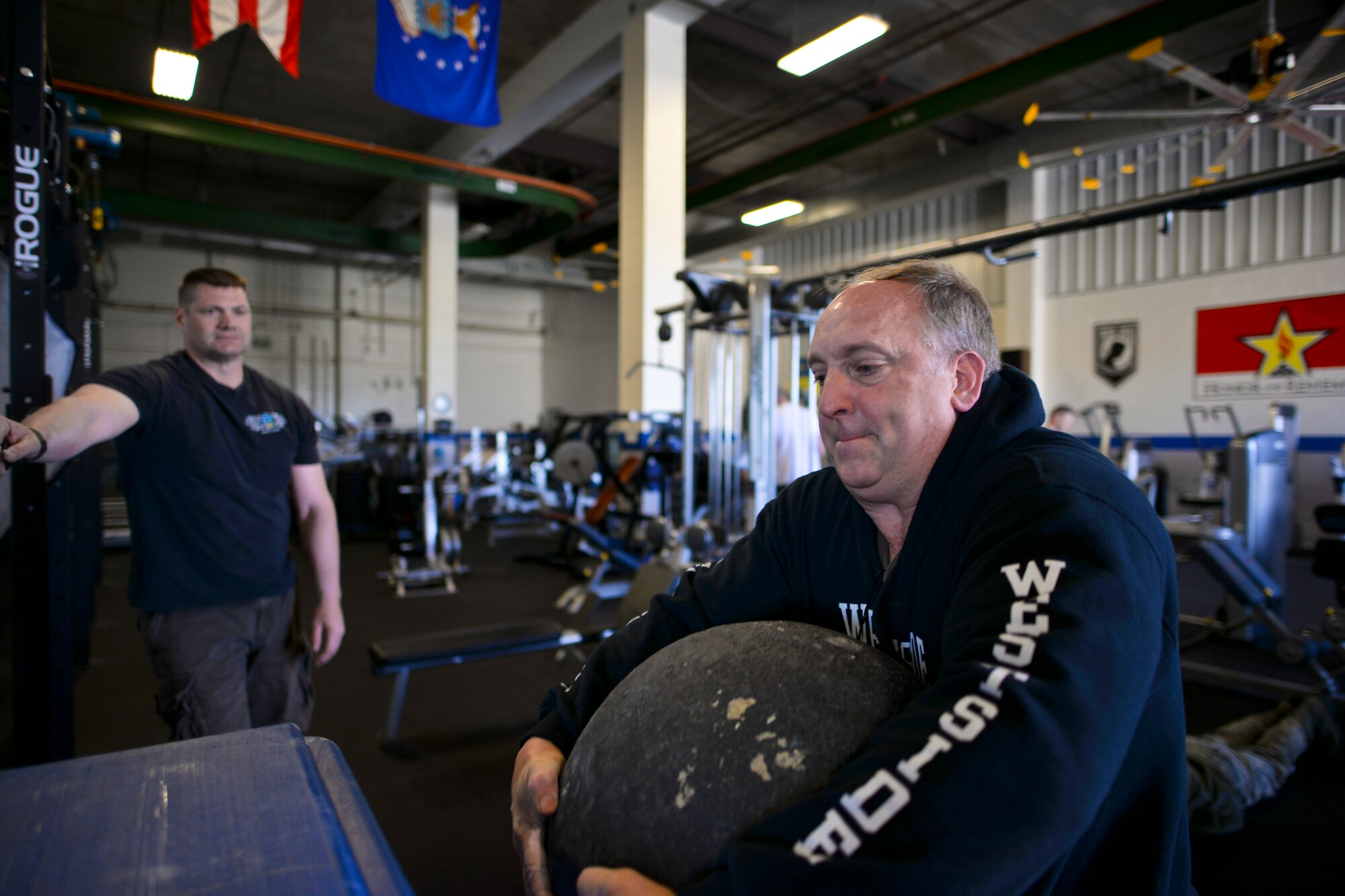 U.S. Air Force Lt. Col. Don Braskett trains with a concrete sphere April 28, 2015, at Rickenbacker Air National Guard Base, Ohio. (U.S. Air National Guard photo by Master Sgt. Ralph Branson/Released)
