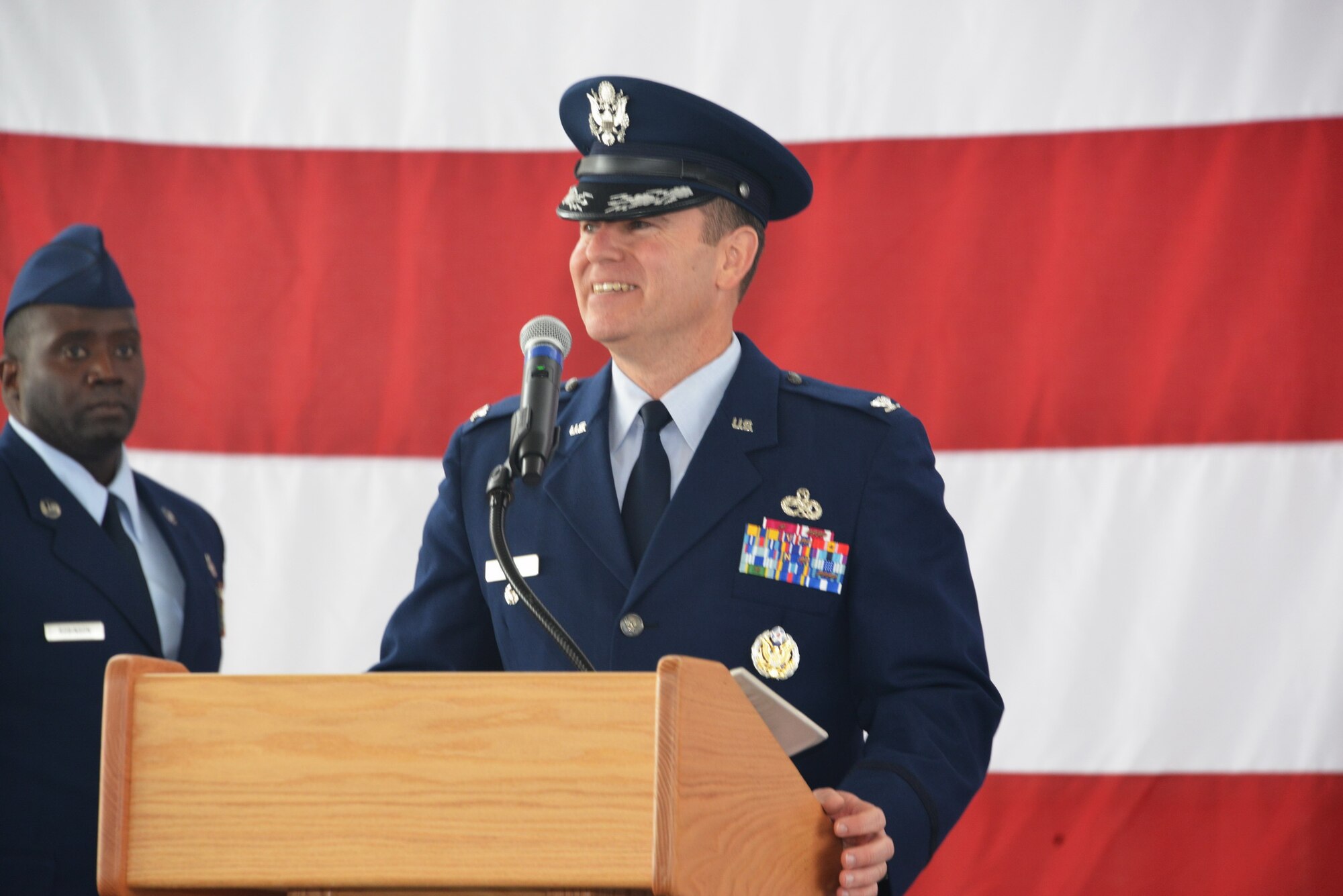 Col. Eric Froehlich, new 377th Air Base Wing and installation commander, address an audience at his change of command ceremony May 21.  Froehlich was formerly the vice commander at Sheppard AFB, Texas.  (Photo by Dennis Carlson)