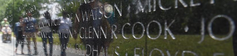 Air Force Capt. Glenn Cook’s name is inscribed on Vietnam Veteran’s Memorial in Washington, D.C., where the U.S. Air Force Honor Guard held a flag folding ceremony May 19, 2015. Cook’s plane was shot down near Nha Trang, Vietnam, Oct. 21, 1969. His remains were never found. (U.S. Air Force photo/Senior Airman Joshua R. M. Dewberry)