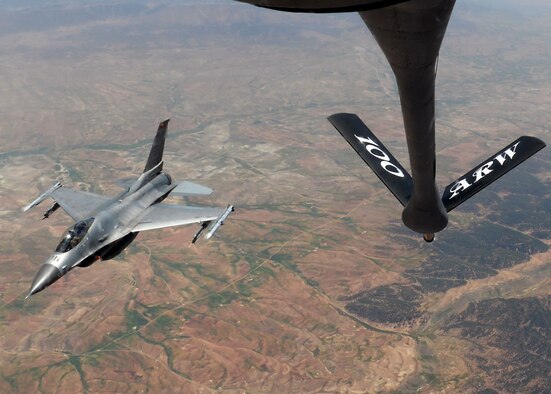 An F-16 Fighting Falcon from Spangdahlem Air Base, Germany, releases after receiving fuel from a KC-135 Stratotanker assigned to RAF Mildenhall, England, while participating in Exercise African Lion May 15, 2015. The U.S. Marine Corps-led exercise encompasses more than six different nations working together to enhance interoperability. (U.S. Air Force photo by Senior Airman Victoria H. Taylor/Released)