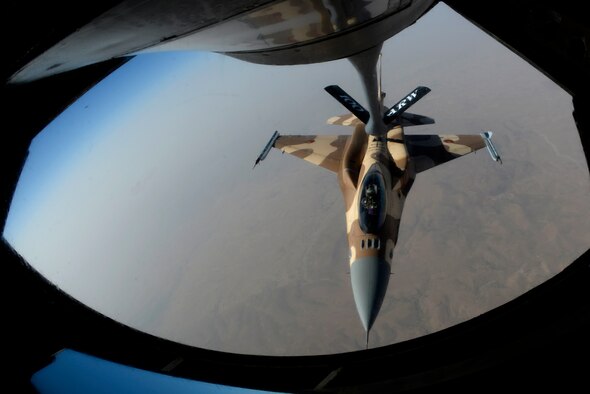 A Royal Moroccan air force F-16 receives fuel from a KC-135 Stratotanker assigned to RAF Mildenhall, England, while participating in Exercise African Lion May 18, 2015, the exercise features first-time integrated flying operations training. African Lion is the largest Department of Defense exercise in Africa, with a vision to maximize interoperability between militaries. (U.S. Air Force photo by Senior Airman Victoria H. Taylor/Released)