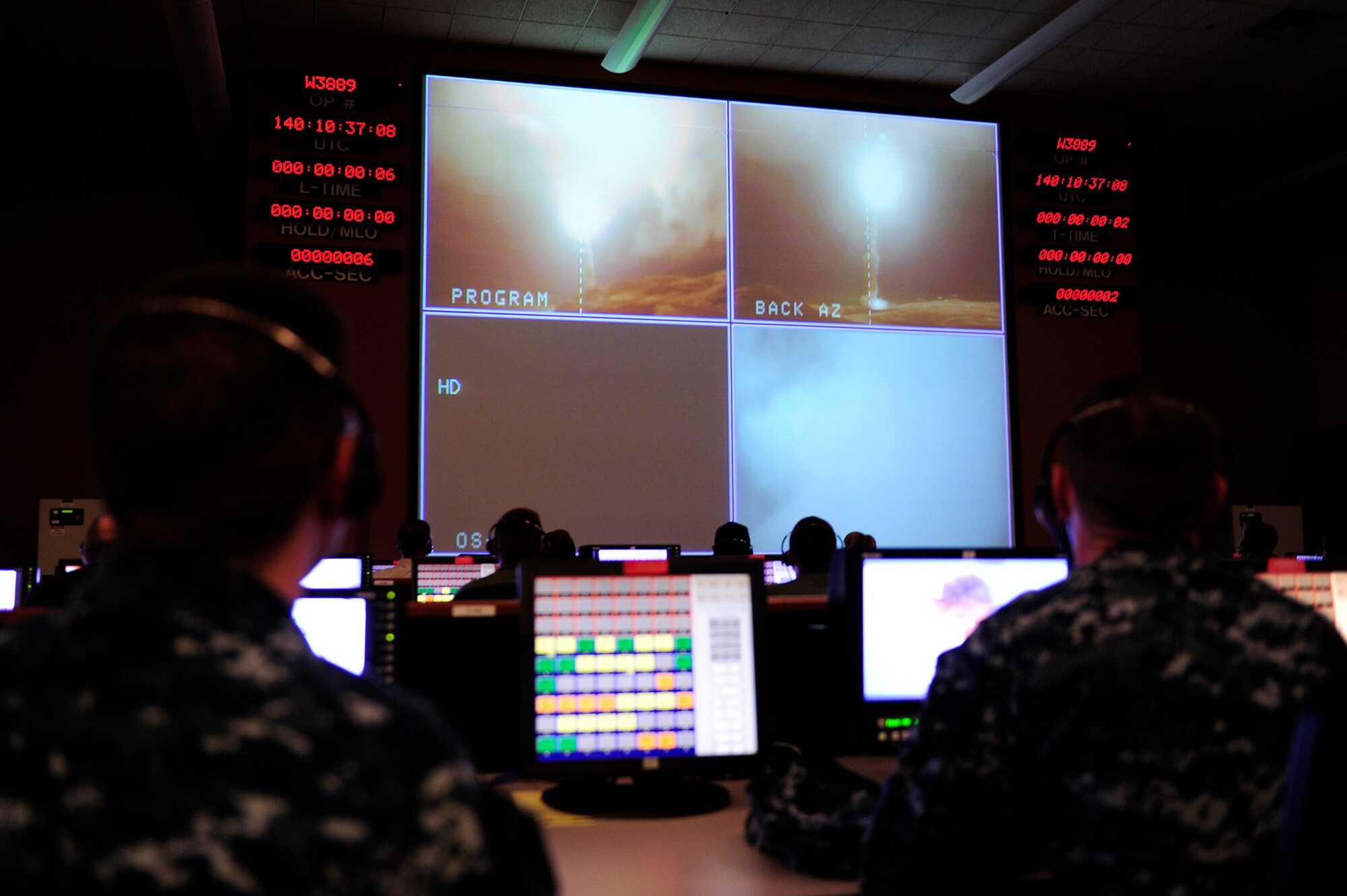 Launch team members and visitors watch as an unarmed Minuteman III intercontinental ballistic missile launches from Vandenberg Air Force Base, California, at 3:37 a.m. Pacific Daylight Time, May 20, 2015. The ICBM was randomly pulled from a silo on F.E. Warren, transported and reassembled at Vandenberg, and launched by crew members from the 625th Strategic Operations Squadron, aboard a U.S. Strategic Command E-6B Airborne Command Post aircraft. Every test launch verifies the accuracy and reliability of the ICBM weapon system, providing valuable data to ensure a safe, secure and effective deterrent for as long as nuclear weapons exist. (U.S. Air Force photo by Staff Sgt. Jim Araos/Released)