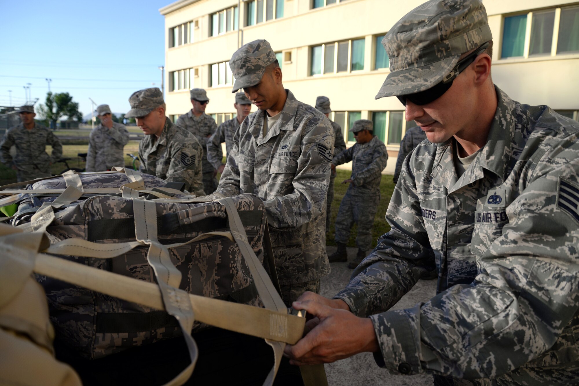 U.S. Air Force Airmen from the 100th Air Refueling Wing prepare cargo for shipping May 11, 2015, at Moron Air Base, Spain. Airmen returned home to support Operation Juniper Micron from home station, giving the 100th ARW more flexibility to execute the ongoing mission in Mali. Juniper Micron is the U.S. military support of French combat operations in Mali. (U.S. Air Force photo by Senior Airman Christine Halan/Released)