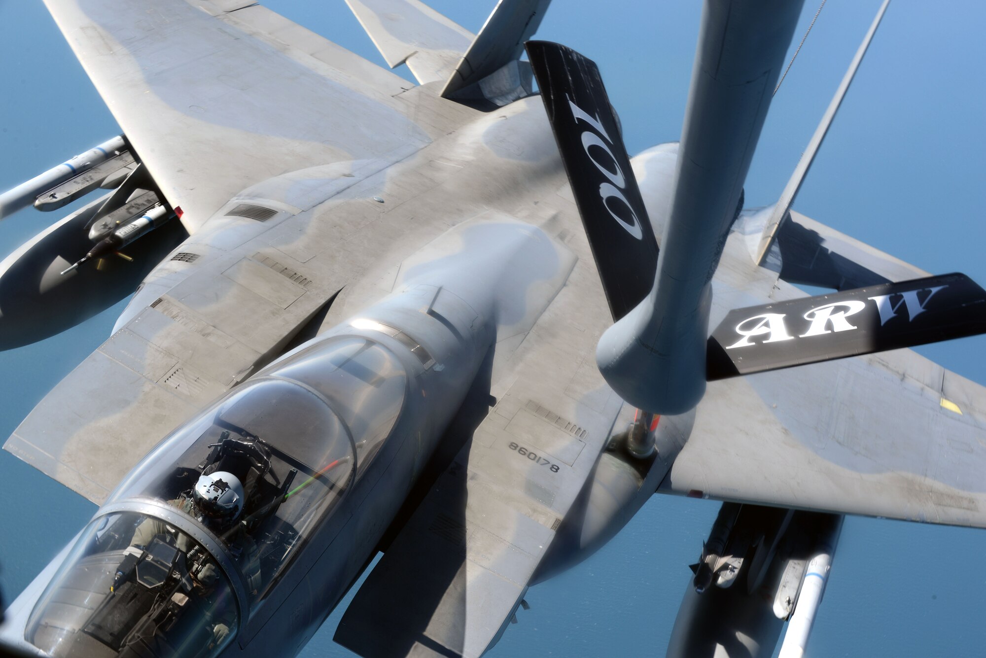 A U.S. Air Force F-15E Strike Eagle from the 48th Fighter Wing, takes on fuel from a KC-135 Stratotanker from the 100th Air Refueling Wing May 12, 2015, over England. Refueling took place for routine training.  (U.S. Air Force photo by Senior Airman Christine Halan/Released)