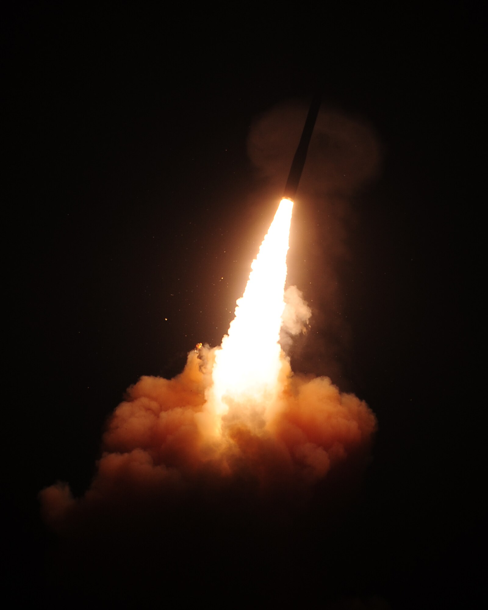 An unarmed Minuteman III intercontinental ballistic missile launches from Vandenberg Air Force Base, California, at 3:37 a.m. Pacific Daylight Time, May 20, 2015. The ICBM was randomly pulled from a silo on F.E. Warren, transported and reassembled at Vandenberg, and launched by crew members from the 625th Strategic Operations Squadron, aboard a U.S. Strategic Command E-6B Airborne Command Post aircraft. Every test launch verifies the accuracy and reliability of the ICBM weapon system, providing valuable data to ensure a safe, secure and effective deterrent for as long as nuclear weapons exist. (U.S. Air Force photo by Joe Davila)
