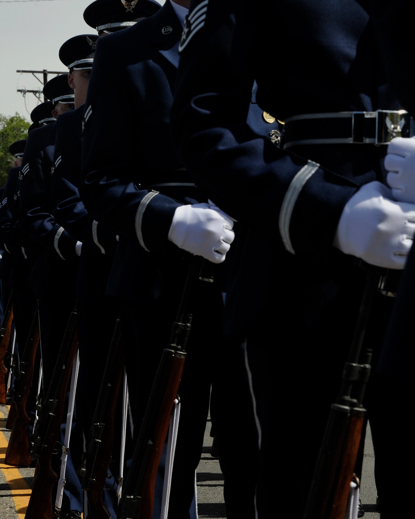 The U.S. Air Force Honor Guard stands at ease during the 51st Annual Memorial Day Parade in Commerce City, Colo., May 25, 2015. The Honor Guard showcases the pride and professionalism of the Air Force during every event it participates in. (U.S. Air Force photo by Senior Airman Preston Webb/Released)