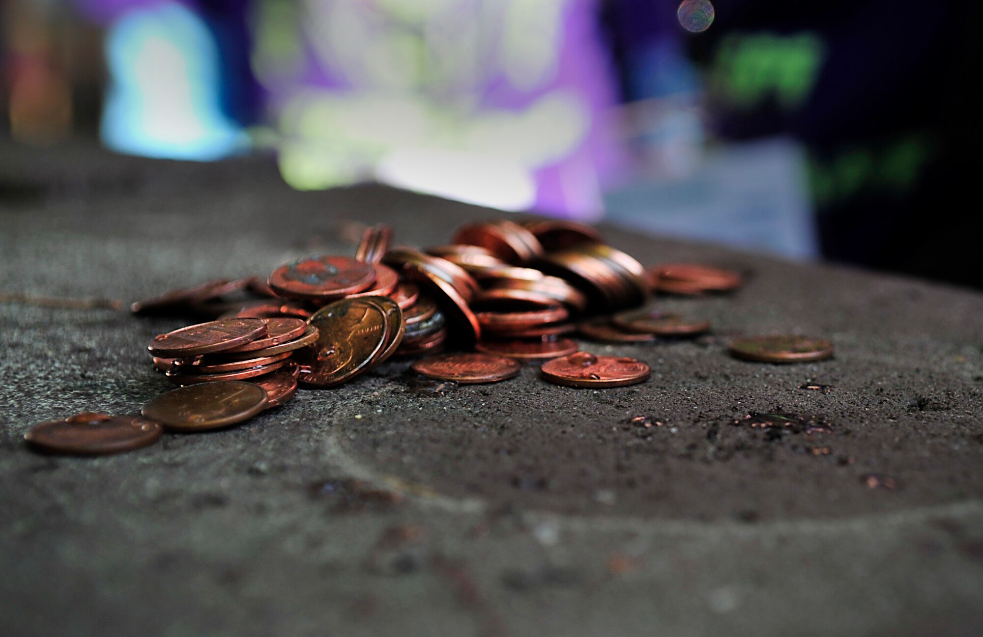 Pennies are used as weights to test the construction of the middle school students’ aluminum foil boats as part of a STEMposium challenge May 13, 2015, at Ramstein Air Base, Germany. Middle School students from all around Germany were tested on their science, technology, engineering and math skills in different challenges. (U.S. Air Force photo/Airman 1st Class Larissa Greatwood)