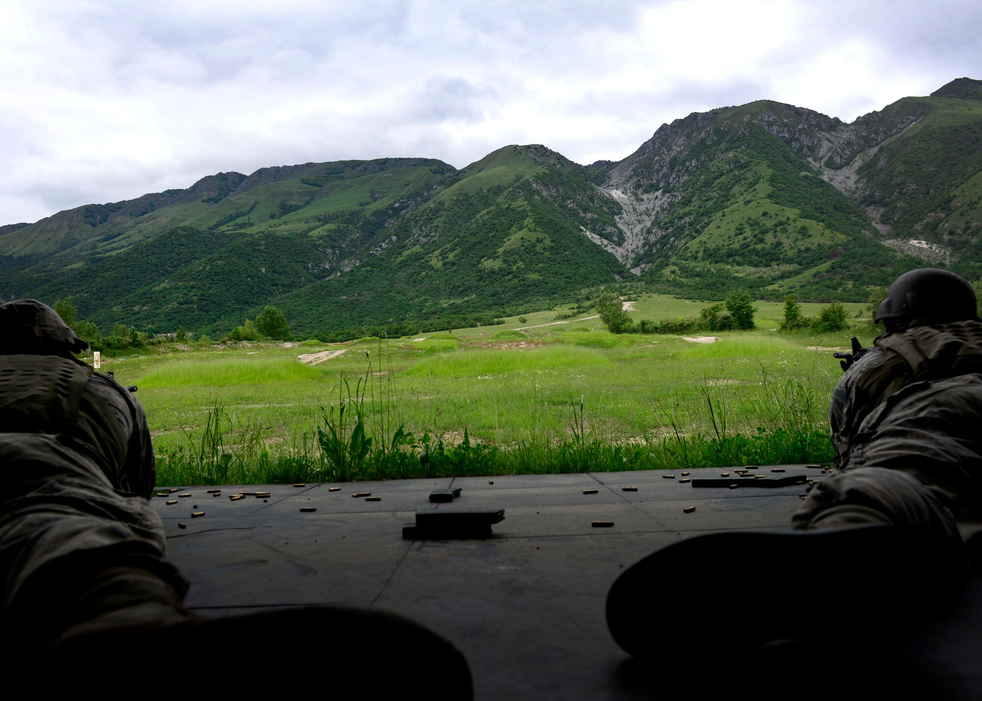 U.S. Air Force Airmen assigned to the 31st Security Forces Squadron practice full distance shooting at the CAO Malnisio Range, May 21, 2015 in Pordenone, Italy. The Airmen were hand-selected by their squadron to serve as designated marksmen. (U.S. Air Force photo by Senior Airman Areca T. Wilson/Released)