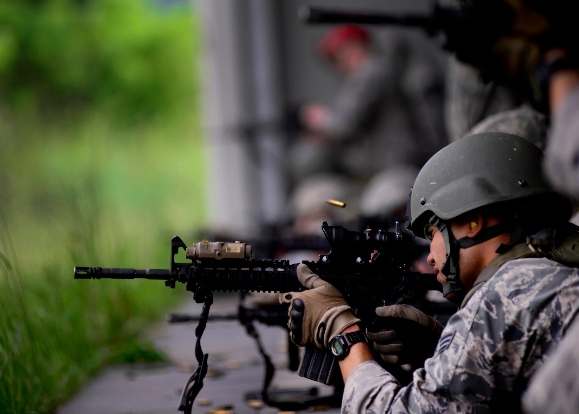 U.S. Air Force Airmen assigned to the 31st Security Forces Squadron practice full distance shooting at the CAO Malnisio Range, May 21, 2015, in Pordenone, Italy. The Airmen were hand-selected by their squadron to serve as designated marksmen. (U.S. Air Force photo by Senior Airman Areca T. Wilson/Released)