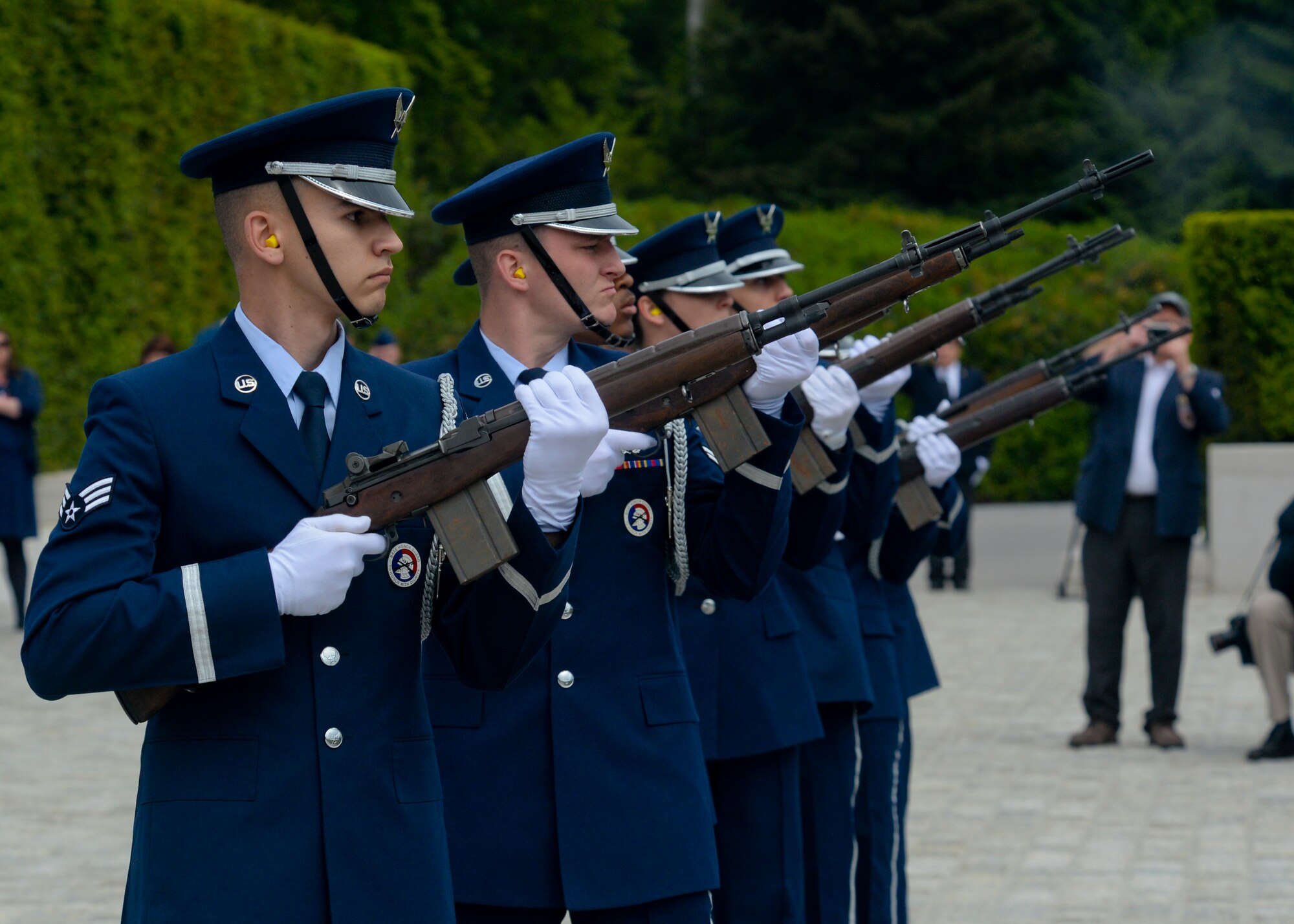 A U.S. Air Force Honor Guard detail executes a ceremonial volley during a Memorial Day ceremony at the Luxembourg American Cemetery and Memorial in Luxembourg, May 23, 2015. The base's Airmen also served as a ceremonial flight in service dress, caretakers of the cemetery's Luxembourg and U.S. flags, and escorts for guests to lay wreaths. (U.S. Air Force photo by Staff Sgt. Joe W. McFadden/Released)  