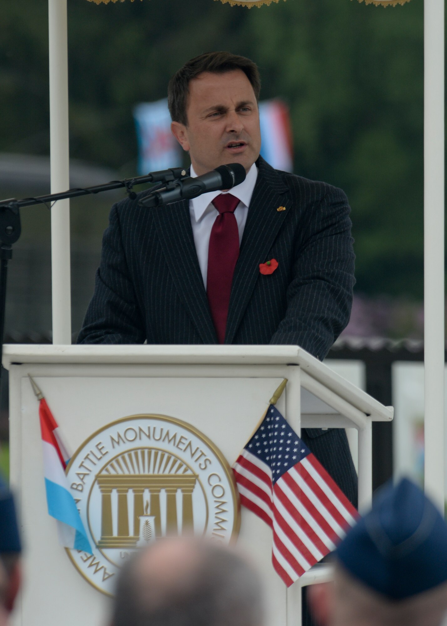Xavier Bettel, prime minister of Luxembourg, speaks during a Memorial Day ceremony at the Luxembourg American Cemetery and Memorial in Luxembourg, May 23, 2015. Memorial Day is observed on the last Monday of May in remembrance of those who gave the ultimate sacrifice and has origins beginning with the memorial observances for the Civil War. (U.S. Air Force photo by Staff Sgt. Joe W. McFadden/Released)  