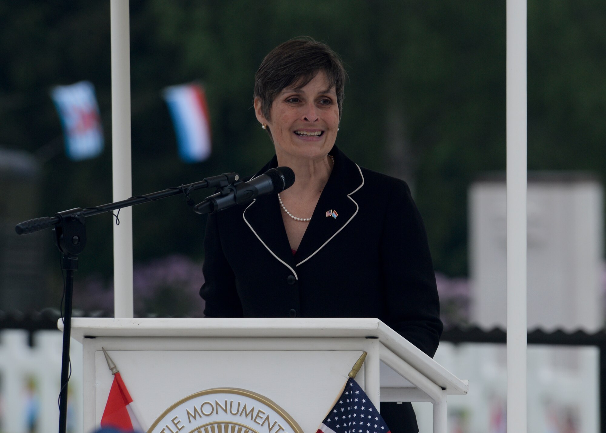 Alison Shorter Lawrence, deputy chief of mission for the U.S. Embassy in Luxembourg, speaks during a Memorial Day ceremony at the Luxembourg American Cemetery and Memorial in Luxembourg, May 23, 2015. More than 300 Luxembourgers and Americans gathered at the cemetery to reflect on the sacrifices made by fallen U.S. service members. (U.S. Air Force photo by Staff Sgt. Joe W. McFadden/Released)  