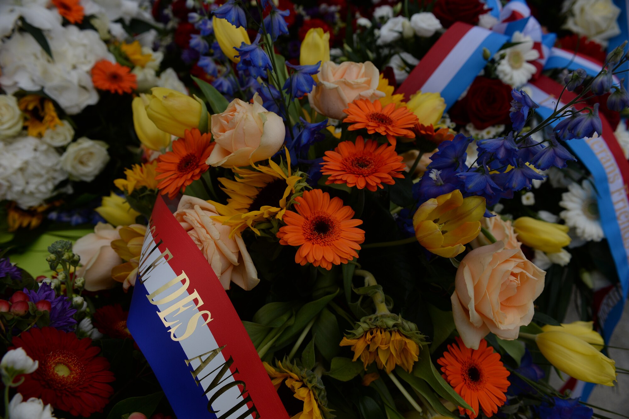 A collection of wreaths lay on a table before a Memorial Day ceremony at the Luxembourg American Cemetery and Memorial in Luxembourg, May 23, 2015. More than 300 Luxembourgers and Americans gathered at the cemetery to reflect on the sacrifices made by fallen U.S. service members. (U.S. Air Force photo by Staff Sgt. Joe W. McFadden/Released)  