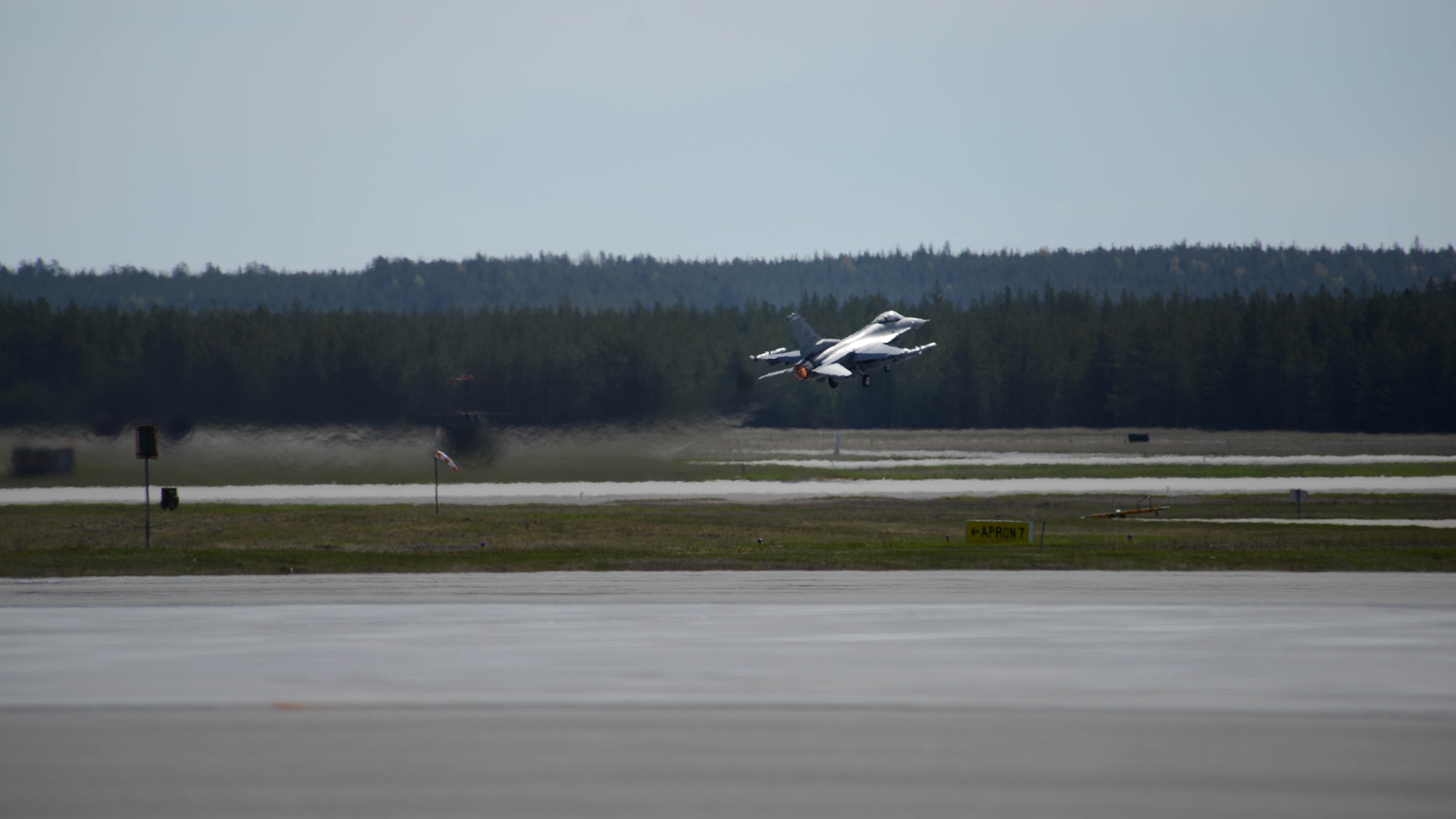 An F-16 Fighting Falcon with the 510th Fighter Squadron from Aviano Air Base, Italy, takes off from Kallax Air Base, Sweden, May 25, 2015, during Arctic Challenge Exercise 2015. Nine nations will participate during the exercise to help ensure interoperability, and strengthen relationships and engagements with NATO allies and Partners for Peace. (U.S. Air Force photo by Staff Sgt. Evelyn Chavez)