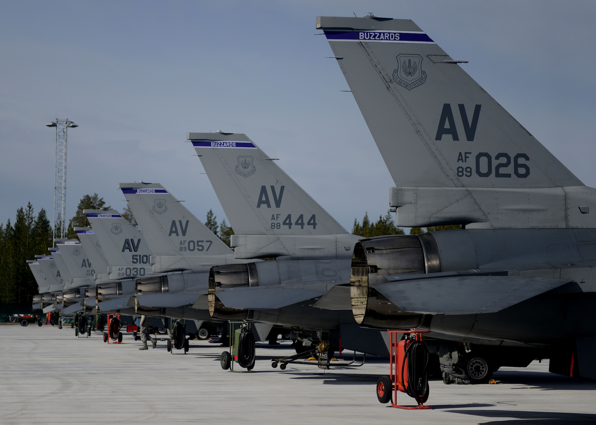 U.S. Air Force F-16 Fighting Falcons with the 510th Fighter Squadron from Aviano Air Base, Italy, wait for takeoff from Kallax Air Base, Sweden, May 25, 2015, during Arctic Challenge Exercise 2015. Nine nations will participate during the exercise to help ensure interoperability, and strengthen relationships and engagements with NATO allies and Partners for Peace. (U.S. Air Force photo by Staff Sgt. Evelyn Chavez)