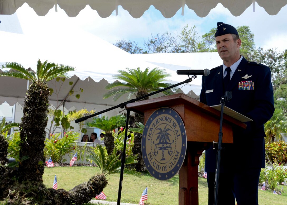 Brig. Gen. Andrew Toth, 36th Wing commander delivers a speech May 25, 2015, at a Memorial Day ceremony at the Guam Veterans Cemetery in Piti. Members from each branch of service and government organizations worked together to honor the sacrifices made by all U.S. veterans, past and present. (U.S. Air Force photo by Staff Sgt. Robert Hicks/Released)