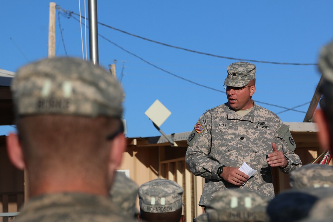 Army Lt. Col. William Gray addresses soldiers during a Memorial Day