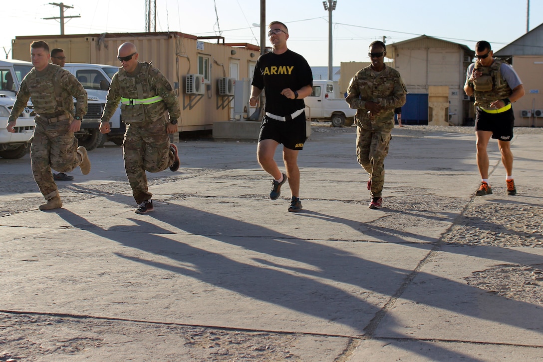 U.S. soldiers participate in "The Murph" workout, named after Navy Lt. Michael P. Murphy, the first service member to receive the Medal of Honor for service in Afghanistan, during a Memorial Day event on Bagram Airfield, Afghanistan, May 24, 2015. The soldiers performed a 1-mile run, 100 pull-ups, 200 push-ups, 300 air squats, and another 1-mile run. Some soldiers opted to do the whole workout wearing their body armor. Navy Lt. Michael P. Murphy, the first service member to receive the Medal of Honor for service in Afghanistan. Murphy, who received the Medal of Honor posthumously on Oct. 22, 2007, was killed in Afghanistan on June 28, 2005, after exposing himself to enemy fire and knowingly leaving his position of cover to get a clear signal in order to communicate with his headquarters. He provided his unit’s location and requested immediate support for his element and then returned to his position to continue fighting until he died from his wounds. 