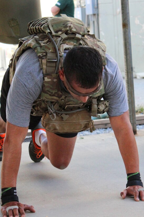 A U.S. soldier participates "The Murph" workout during a Memorial Day event on Bagram Airfield, Afghanistan, May 24, 2015. The workout is named after Navy Lt. Michael P. Murphy, the first service member to receive the Medal of Honor for service in Afghanistan.