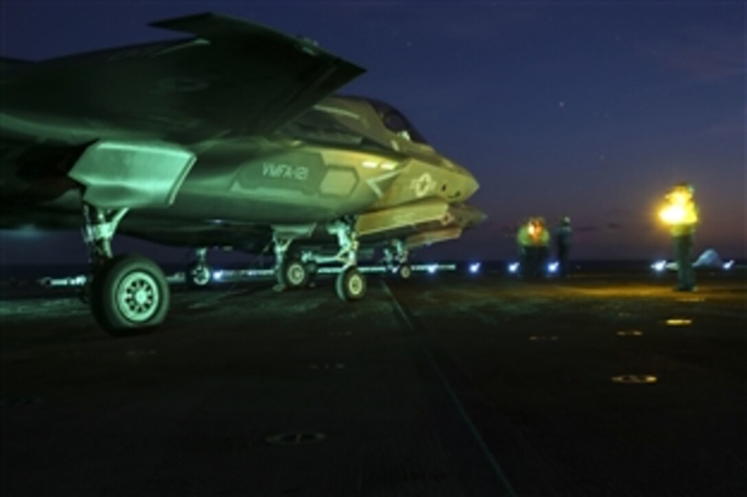An F-35B Lightning II prepares to taxi on the flight deck of the USS Wasp during night operations at sea as part of a Marine Corps operational test, May, 22, 2015. The test, scheduled to continue through May, will assess the integration of the F-35B while operating across an array of flight and deck operations, maintenance operations and logistical supply chain support in an at-sea environment.