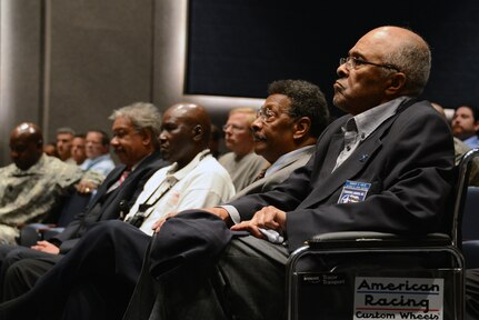Former U.S. Army Air Corps Cpl. Robert D. Holts (right), an original Tuskegee Airman, and representatives from the Alfonza W. Davis Chapter of Tuskegee Airmen Inc. visit members of U.S. Strategic Command, Offutt Air Force Base, Neb., May 26, 2015. During their visit, the delegation shared information about their organization, told stories about Holts' experience in the Army Air Corps and answered questions from the audience. Holts, the last known surviving Tuskegee Airman from Nebraska, was sworn into service at Fort Crook, now Offutt AFB, in 1942 and served as a drafting engineer and logistics specialist until 1946. The term "Tuskegee Airmen" refers to everyone - to include men and women, African Americans and Caucasians - involved in the "Tuskegee Experience," the Army Air Corps program to train African Americans to fly and maintain combat aircraft. Contrary to popular belief, this includes not just pilots, but navigators, bombardiers, maintenance support staff, instructors and all personnel who kept the planes in the air. USSTRATCOM is one of nine DoD unified combatant commands and is charged with strategic deterrence; space operations; cyberspace operations; joint electronic warfare; global strike; missile defense; intelligence, surveillance and reconnaissance; combating weapons of mass destruction; and analysis and targeting. (USSTRATCOM photo by U.S. Air Force Staff Sgt. Jonathan Lovelady)