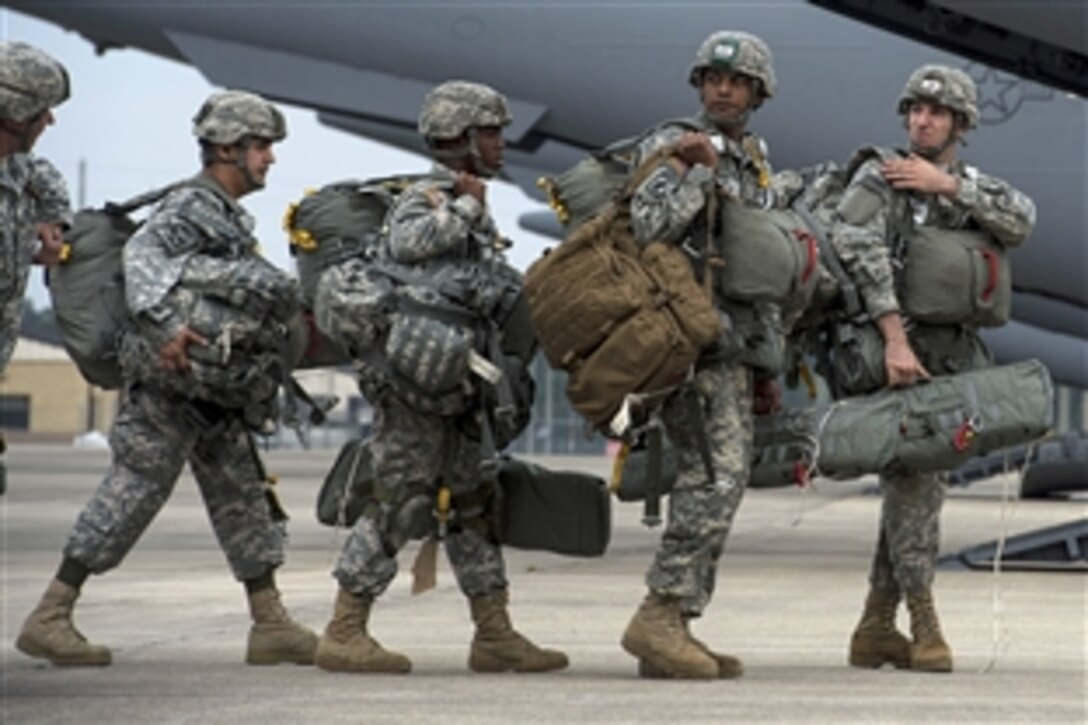 Army paratroopers prepare to board an Air Force C-17 Globemaster III aircraft during Crescent Reach 15 on Fort Bragg, N.C., May 21, 2015. The paratroopers are assigned to the 82nd Airborne Division.