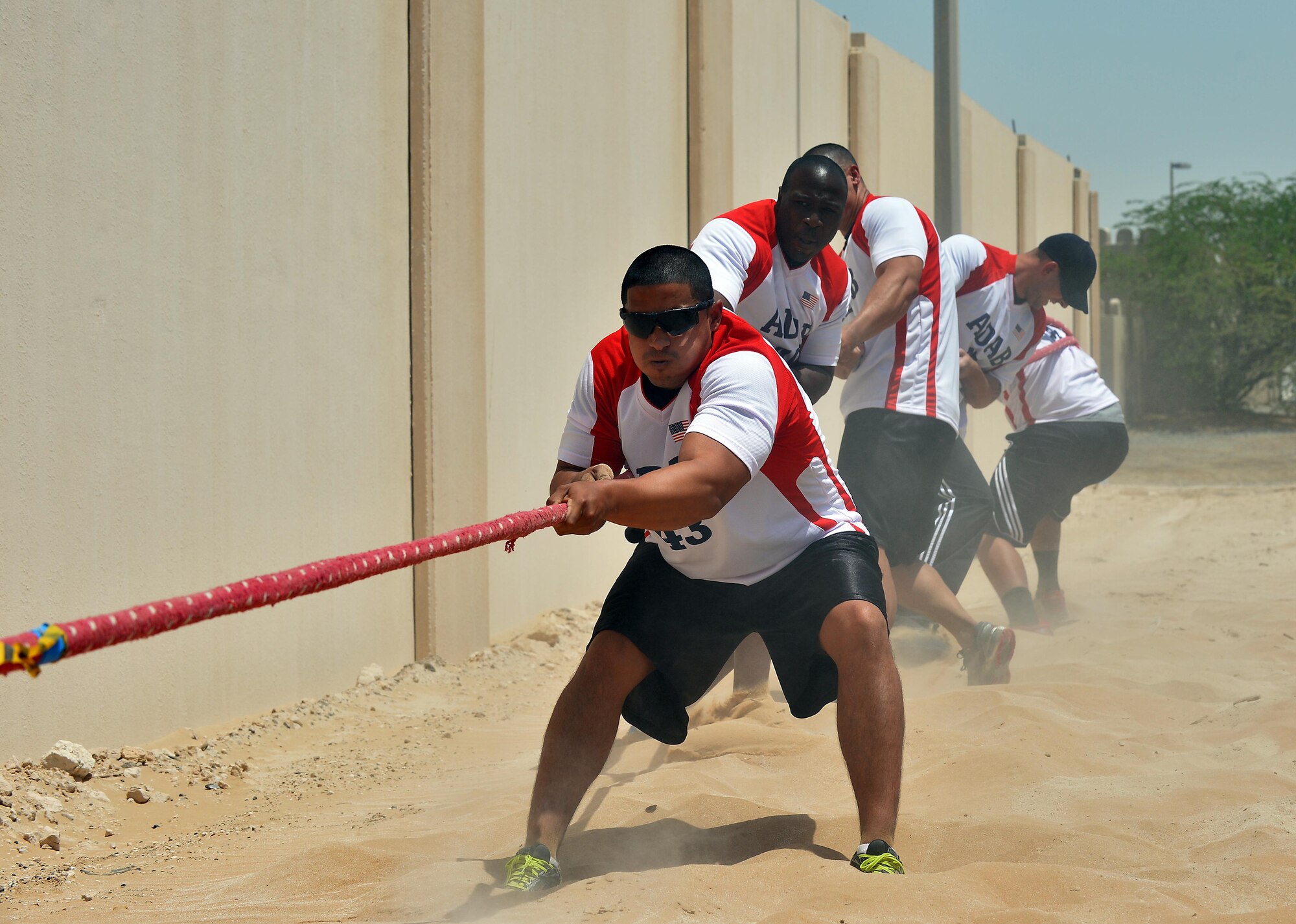 The U.S. tug-o-war team competes in the Friendship Games at undisclosed location in Southwest Asia May 27, 2015. The tri-sport event is held every two months. In this installment of the games, teams went head-to-head in a 5K run, volleyball and tug-o-war. (U.S. Air Force photo/ Tech. Sgt. Jeff Andrejcik)
