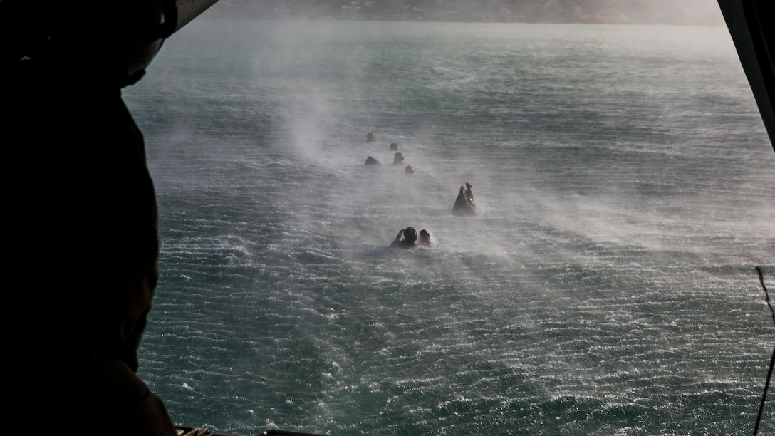 U.S. Marines with the 15th Marine Expeditionary Unit’s Maritime Raid Force helocast out of a CH-53 Super Stallion aboard Marine Corps Base Hawaii, May 14, 2015. The MRF is building on their success during the 15th MEU’s pre-deployment training program to ensure they are ready for a wide variety of missions. (U.S. Marine Corps photo by Cpl. Anna Albrecht/Released)