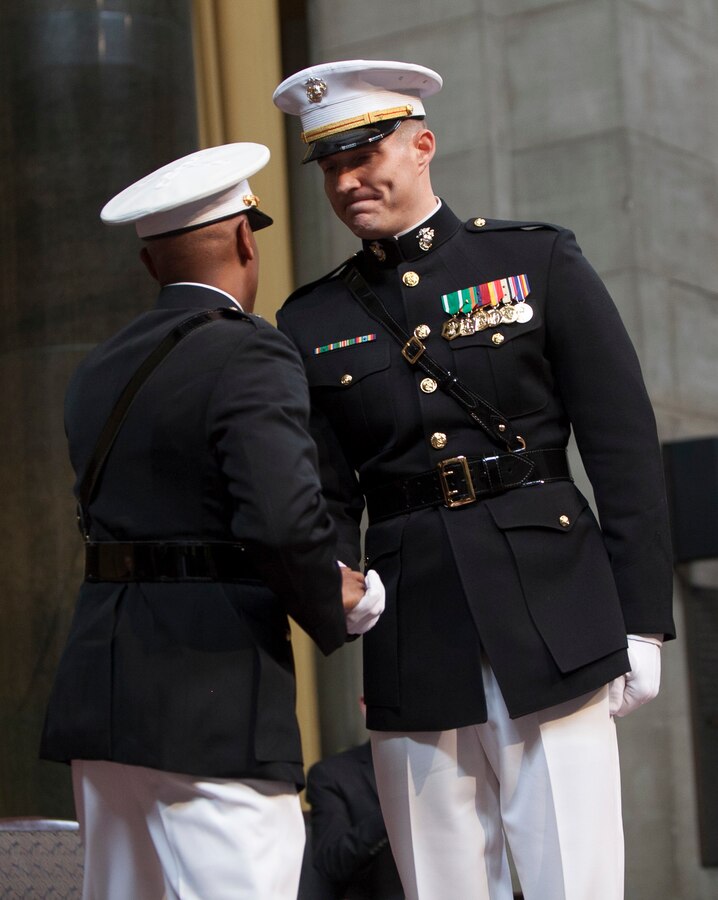 Staff Sgt. Patrick Poorbaugh is congratulated by Brig. Gen. Terry Williams after administering the oath of office at the Low Memorial Library Rotunda, Columbia University, New York, May, 21. Poorbaugh became the first Marine in 40 years to commission from the school. Poorbaugh is a Mackinaw, Ill., native, and graduated with a degree in Political Science from the College of General Studies. Williams is commanding general of Eastern Recruiting Region and Marine Corps Recruit Depot Parris Island.