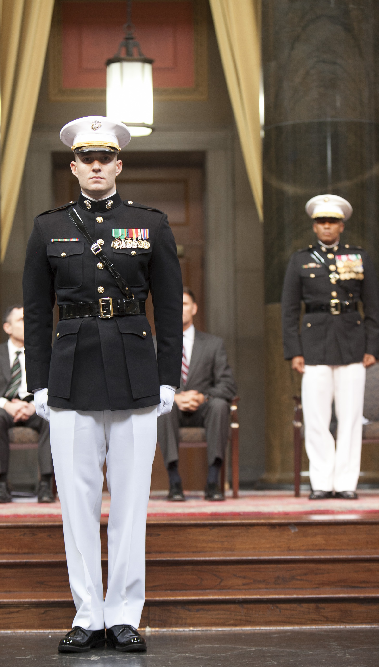 Staff Sgt. Patrick Poorbaugh stands at attention while his citation is read during his commissioning ceremony at the Low Memorial Library Rotunda, Columbia University, New York City, May, 21. Poorbaugh became the first Marine in 40 years to commission from the school. Poorbaugh is a Mackinaw, Illinois, native, and graduated with a degree in Political Science from the College of General Studies.