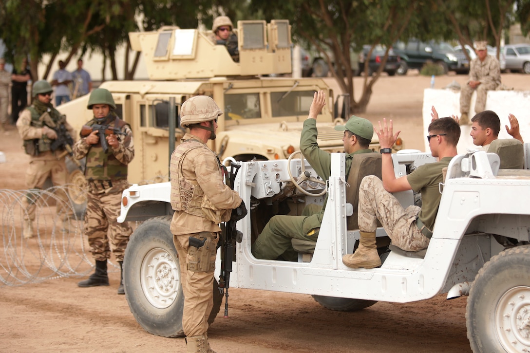 U.S. Marines, Moroccan, Belgium and Dutch soldiers demonstrate vehicle checkpoint procedures May 20 in the Tifnit, Morocco training area. A checkpoint and search process was one of several demonstrations as general officers from participating countries observed what had been accomplished during the week-long training at the camp as a part of Exercise African Lion 2015. Exercise African Lion 15 is an annually-scheduled, combined U.S.–Moroccan exercise designed to improve mutual understanding of each nation’s tactics, techniques and procedures while demonstrating the strong bond between the two nation’s militaries.  The one-week exercise includes various types of military training, including a command post exercise; stability operations, such as nonlethal weapons training and crisis/disaster response training.  Additionally, in February an intelligence capacity building seminar was conducted.
