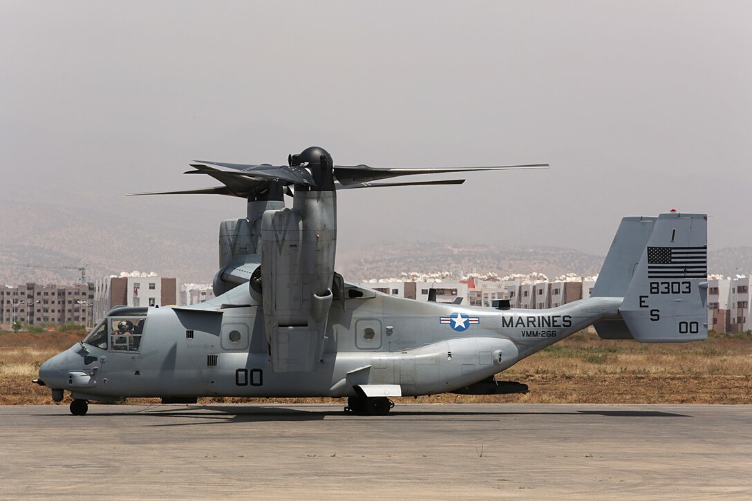 A Marine Corps MV-22 with Special-Purpose Marine Air-Ground Task Force Crisis Response-Africa sits on the Inzegane flightline prior to an orientation flight for distinguished visitors May 20. Four Ospreys with the unit flew down from Moron, Spain to demonstrate the range, speed and capability to insert a contingent of Marines in response to a crisis or natural disaster situation on the continent of Africa during Exercise African Lion 15. The event is an annually-scheduled, combined U.S.–Moroccan exercise designed to improve mutual understanding of each nation’s tactics, techniques and procedures while demonstrating the strong bond between the two nation’s militaries.  The one-week exercise includes various types of military training, including a command post exercise; stability operations, such as nonlethal weapons training and crisis/disaster response training.  Additionally, in February an intelligence capacity building seminar was conducted.