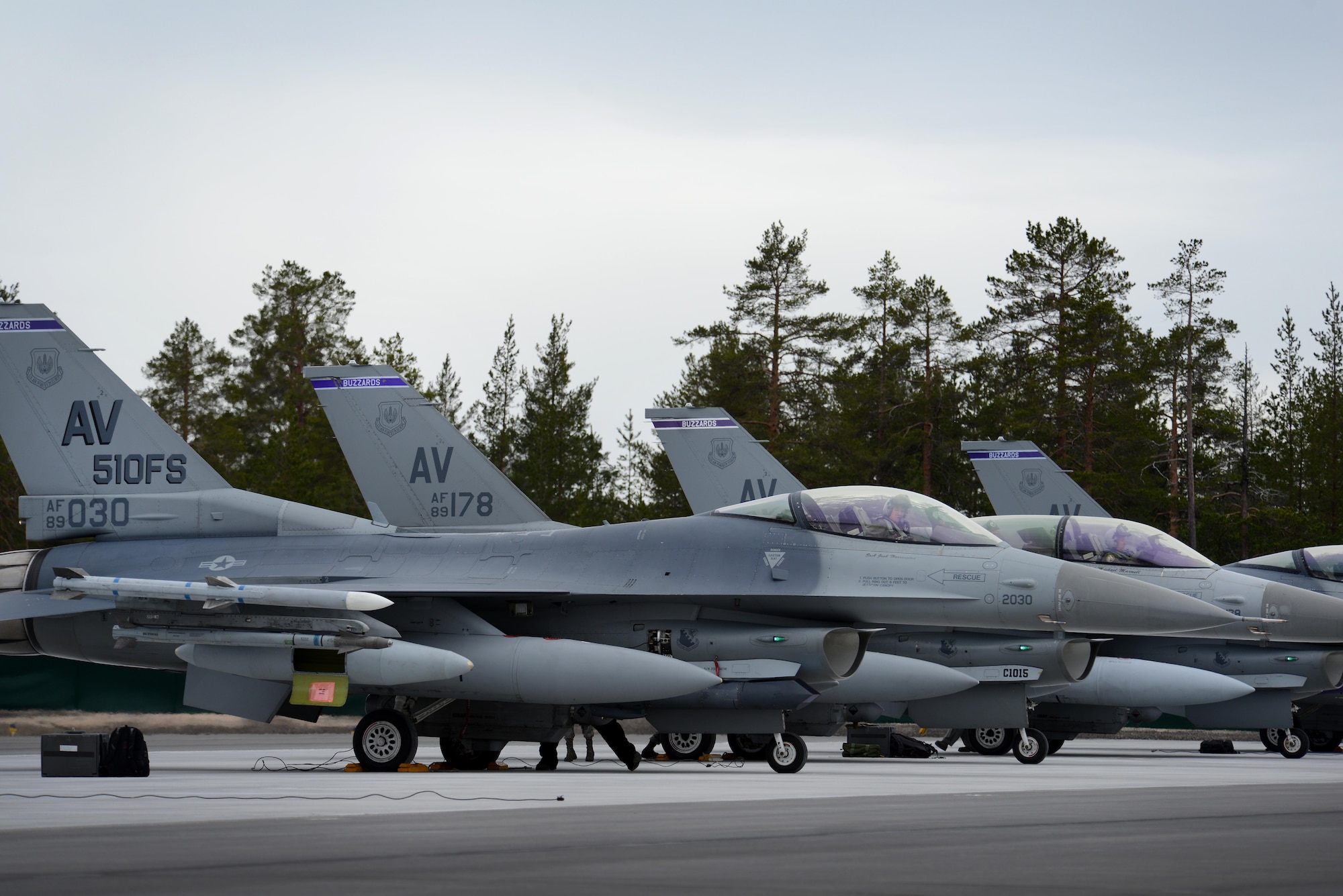 F-16 Fighting Falcons and Airmen from the 510th Fighter Squadron at Aviano Air Base, Italy, arrived at Kallax Air Base, Sweden, May 22, 2015, for Arctic Challenge Exercise 2015. Nine nations participated during the exercise to help ensure interoperability, and strengthen relationships and engagements with NATO allies and Partners for Peace. (U.S. Air Force photo/Staff Sgt. Evelyn Chavez)