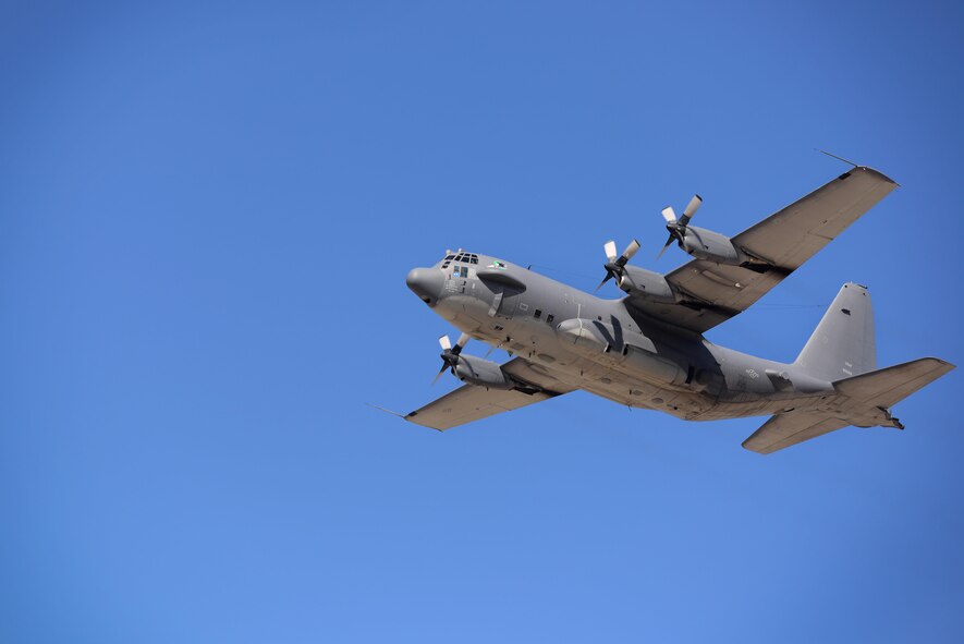 An AC-130H gunship, nicknamed “Excalibur”, flies overhead, May 26, 2015 at Cannon Air Force Base, N.M. The gunship has a long and proud history beginning in Southeast Asia over 46 years ago. (U.S. Air Force photo/Senior Airman Eboni Reece)