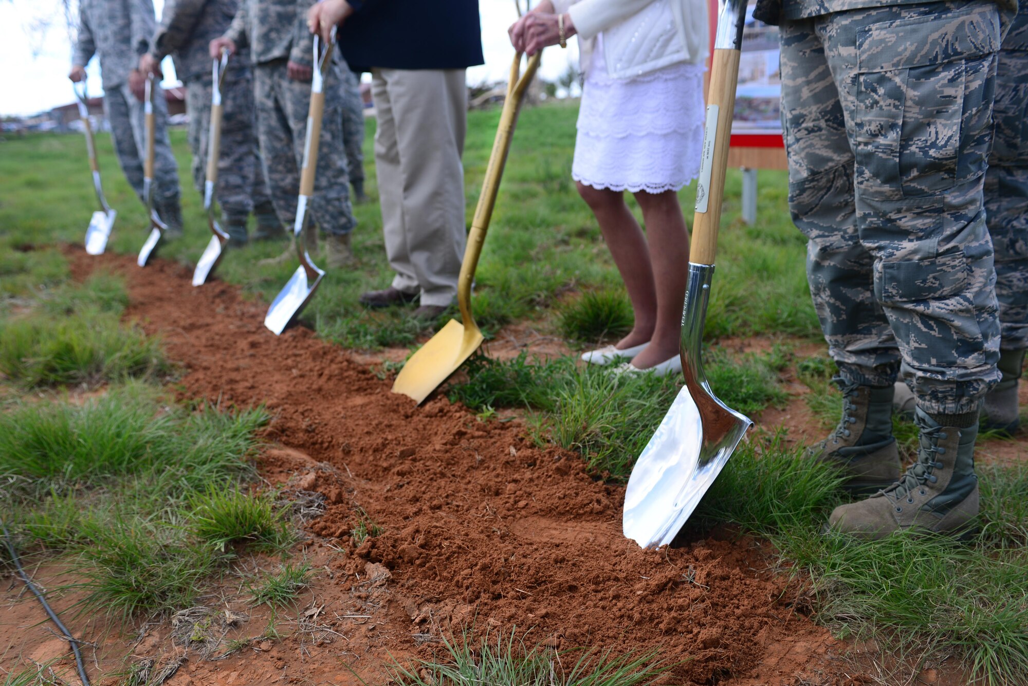 Participants prepare to break ground at the medical clinic groundbreaking ceremony, May 26, 2015 at Cannon Air Force Base, N.M. Construction of the new 112,000 square foot, two-story replacement medical and dental clinic at Cannon will begin in July. (U.S. Air Force photo/ Senior Airman Eboni Reece)